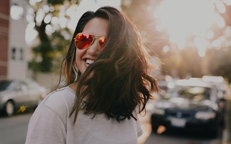 Settle into comfort at EMME a woman wearing sunglasses